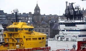 Ships tied up at Aberdeen, Scotland, where much of the UK oil industry is based.