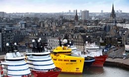 Ships tied up in a harbour in Aberdeen, where much of the British oil industry is based.