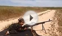 Little Girl Rides A Belt Fed Machine Gun - The Firearm Blog